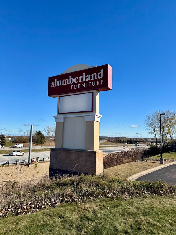 Woodbury Slumberland Furniture road sign