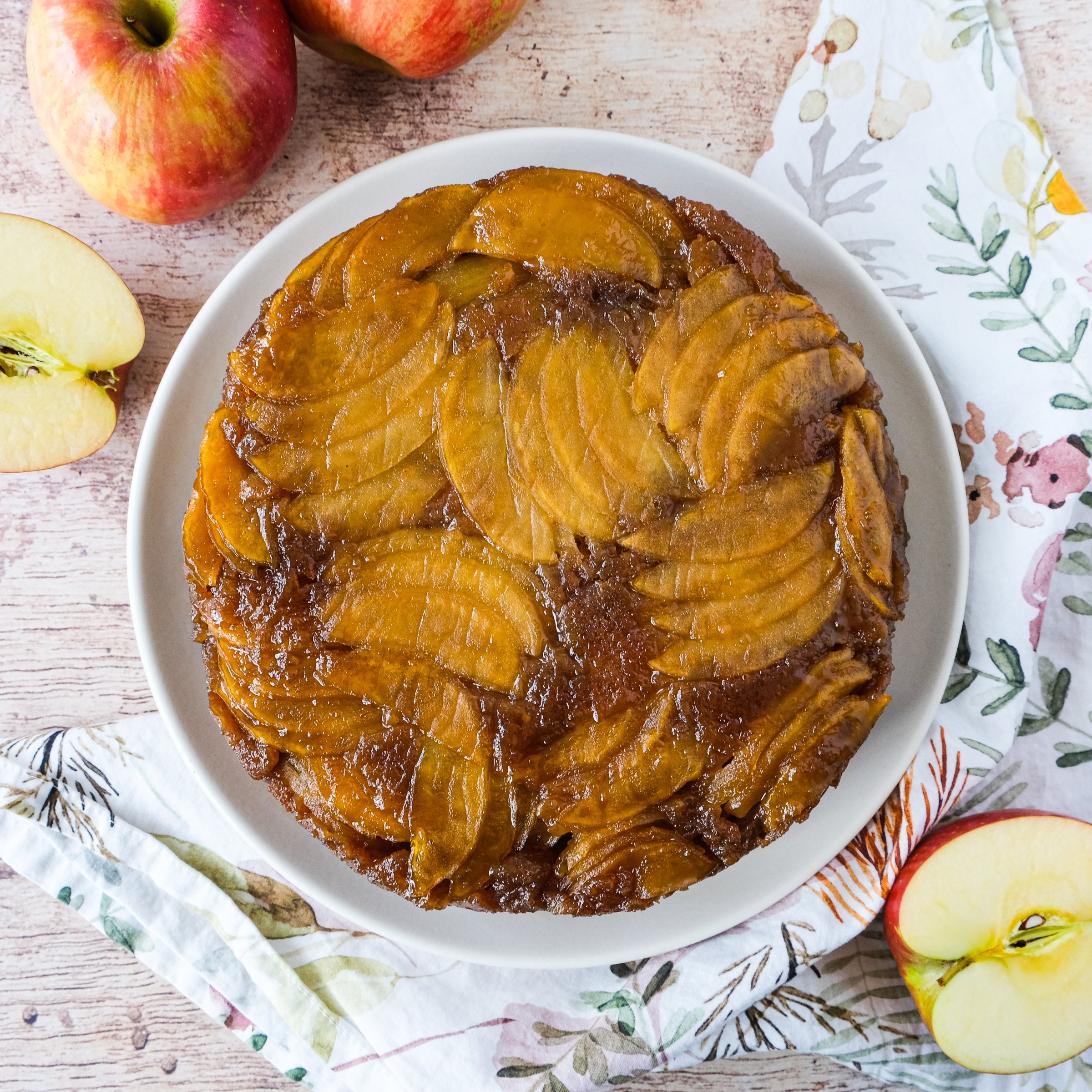 sticky apple upside-down cake with golden raisins