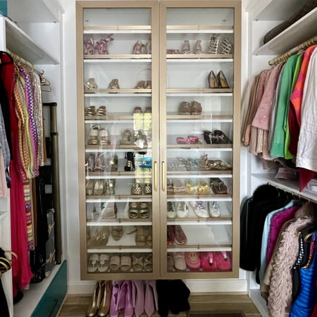 Closet shelving for shoe organization with gold accents California Closets Pensacola & Panama City, Florida