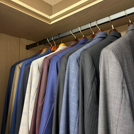 Custom closet hanging space for suite jackets