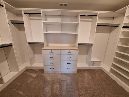 White & Natural Walk-in Closet