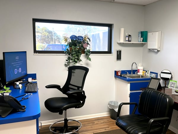 Interior photo of the consultation office for AudioNova hearing clinic in Tavares, FL