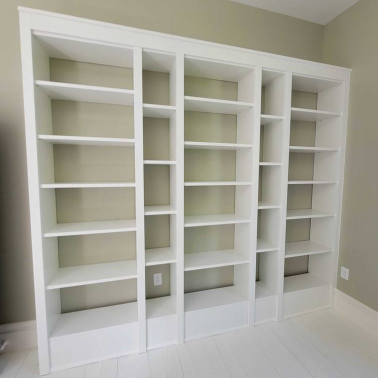 Greensboro - Custom closets - white shelving unit with 3 wide columns and 2 narrow columns in between
