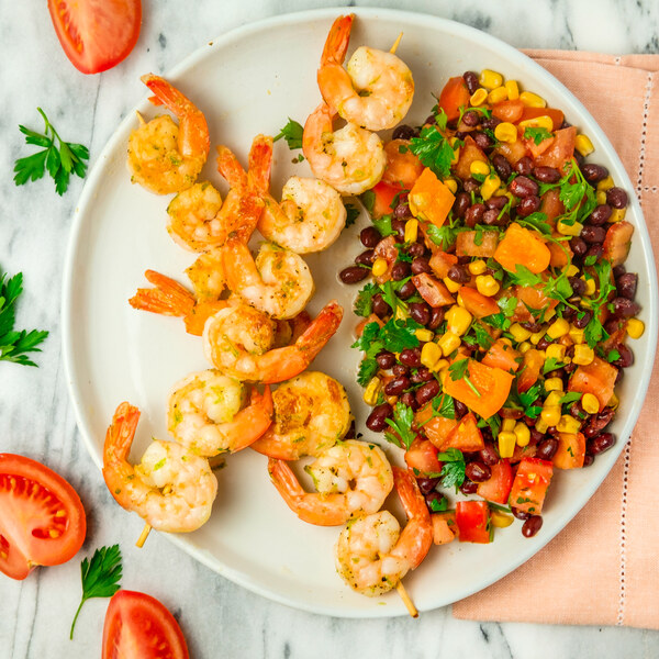 grilled lime shrimp with black bean corn pepper and tomato salad