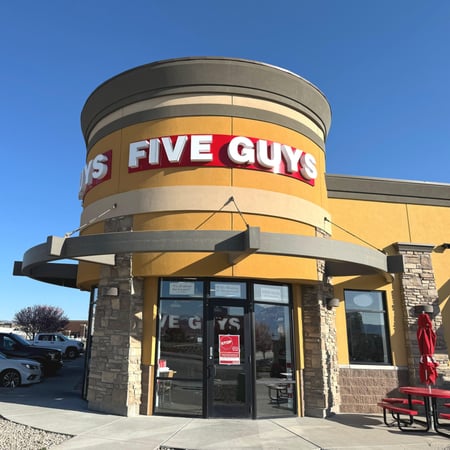 Exterior photograph of the Five Guys restaurant at 12570 South Rhetski Lane in Riverton, Utah.