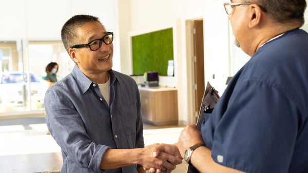 Doctor greeting male patient