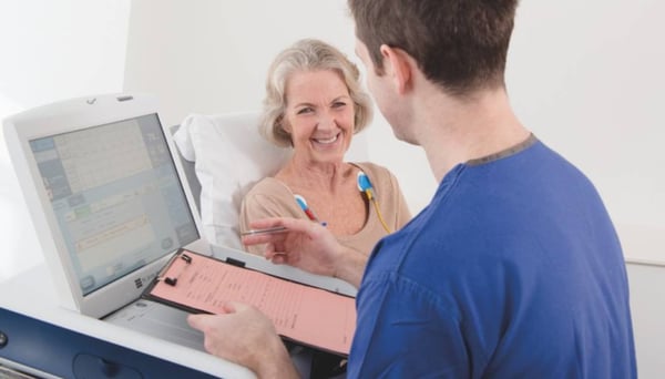 Female patient having heart tests