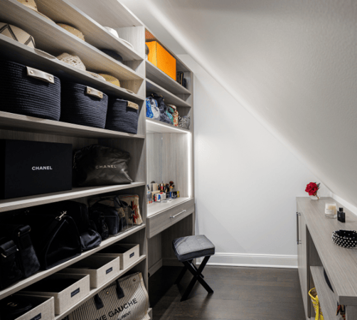 California Closets Rockland County NY Custom Closet Small Spaces Ideas Angled Ceilings Storage Closet Ideas Vanity with Mirror and LED Lighting built in closet adjustable shelving custom hardware