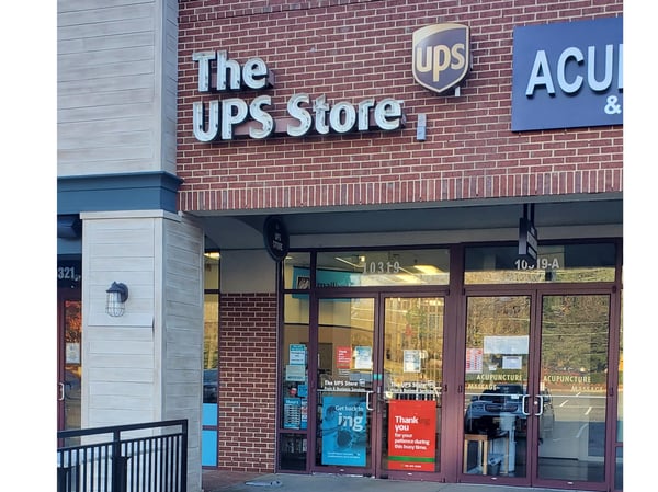 Facade of The UPS Store Westlake Crossing Shopping Center/Montgomery Mall