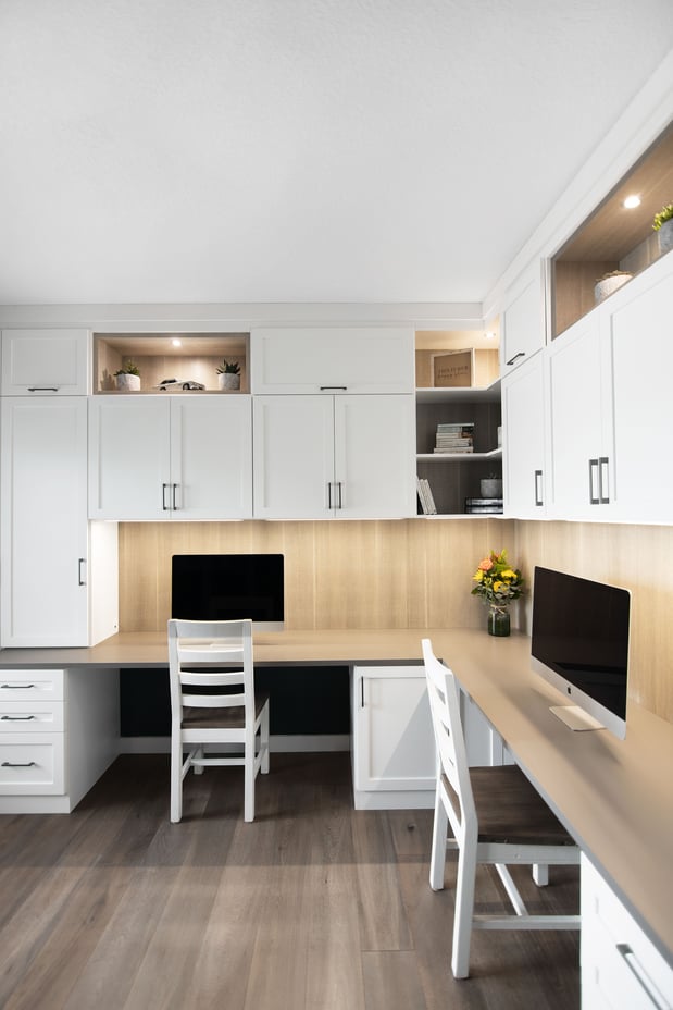 White and Gray Home Office with lower and upper cabinetry, two work stations, and display boxes.