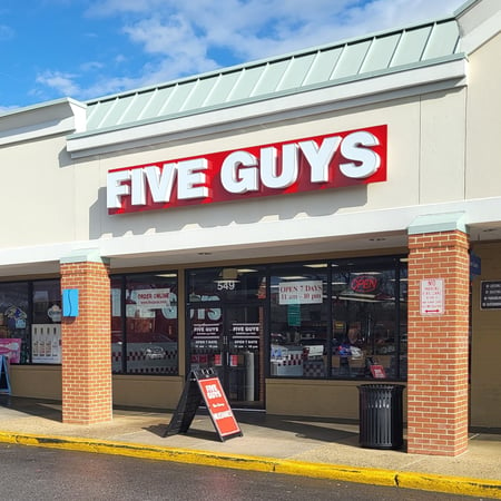 Exterior photograph of the Five Guys restaurant at 549 Ritchie Highway in Severna Park, Maryland.