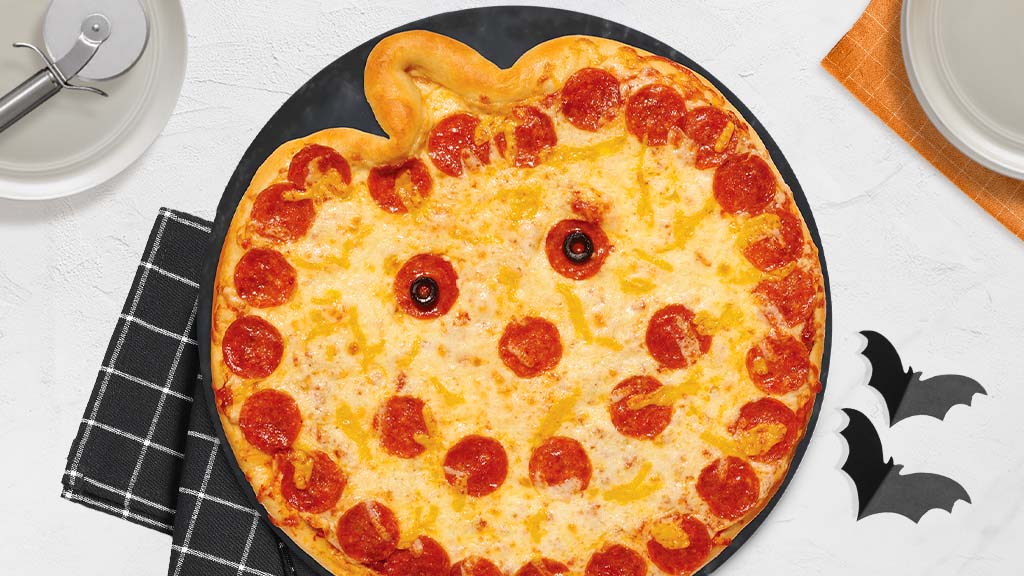 Papa Murphys take and bake jack-o-lantern pizza.