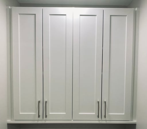 White bathroom closet organization system California Closets Pensacola & Panama City, FL