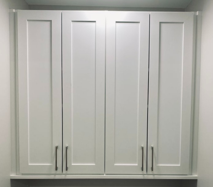White bathroom closet organization system California Closets Pensacola & Panama City, FL