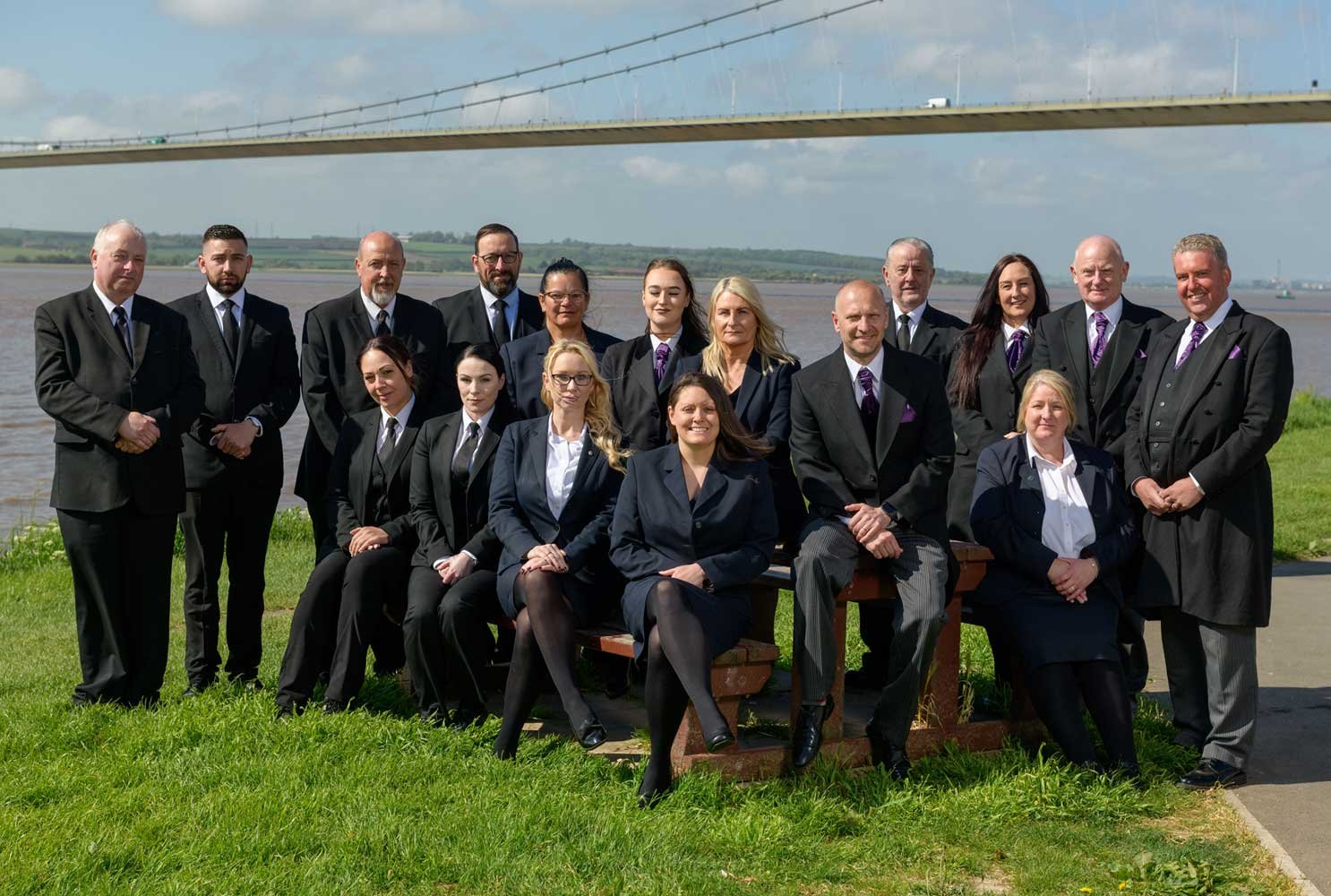 A-Shepherd-funeral-directors-team-outside-infront-of-a-bridge