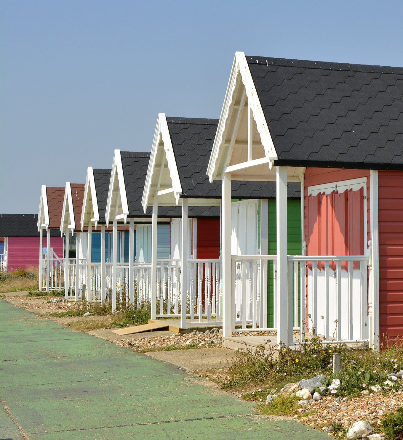 Colourful Painted Beach Huts at Lancing in West Sussex
