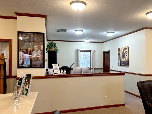 Interior photo of the reception desk of the AudioNova hearing clinic in Fort Wayne, IN