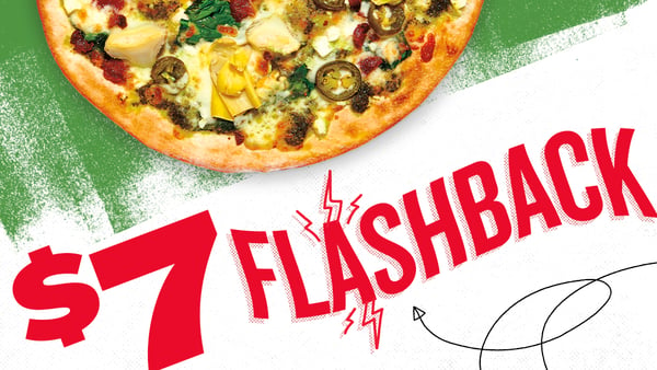$7 Flashback Carmen featuring pesto, spinach, mozzarella, feta, bacon, artichokes, and jalapeños.