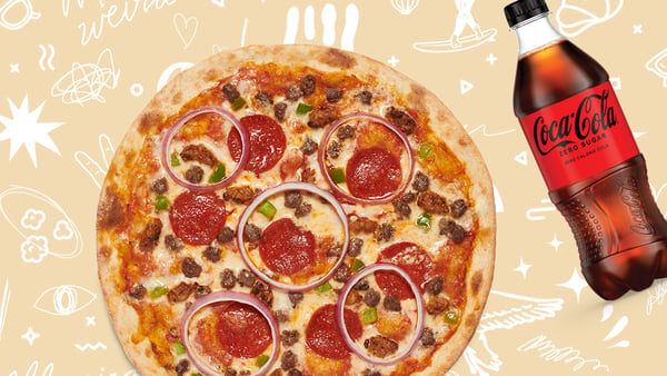 A Mad Dog Pizza, our meat lover's pizza, featuring a bottle coke zero.