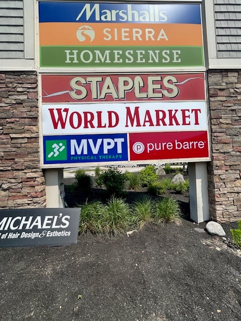 MVPT - Bedford outside signage in the plaza with Staples, World Market and Marshals in New Hampshire.