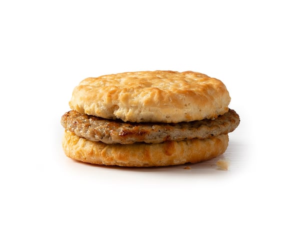 A savory sausage patty on a giant buttermilk biscuit.