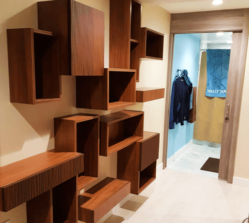 an arrangement of floating shelves and cubbies for storage and display