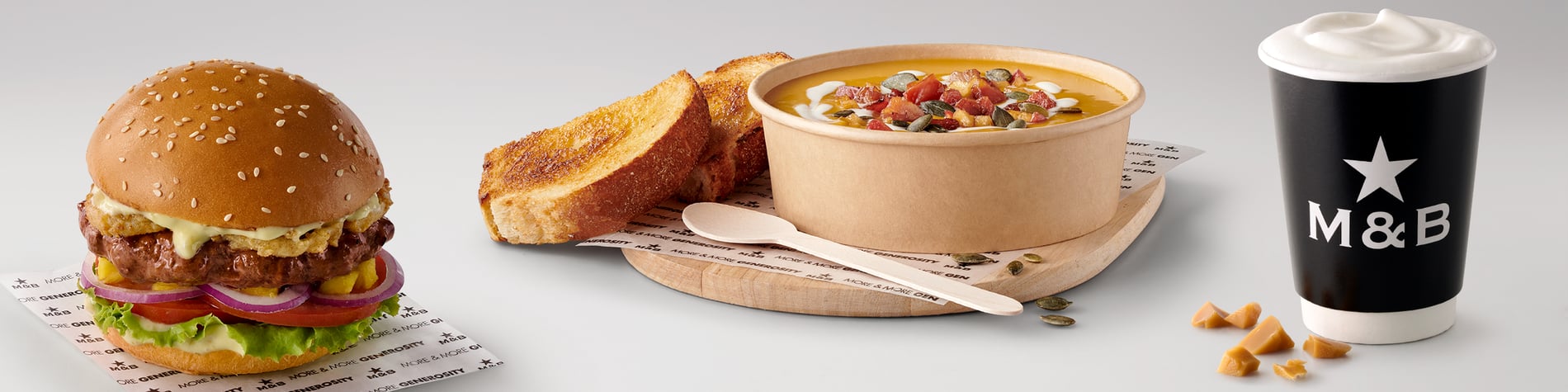 A range of takeaway meals and warm drinks from the Mugg & Bean On-The-Move menu including a Sticky Toffee Latte, Seasonal Soups, and a Creamy Jalapeño Gourmet Burger