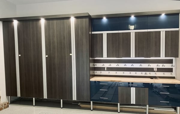Dark brown custom cabinets for garage storage in garage lighting  California Closets Gulf Coast & New Orleans, Louisiana