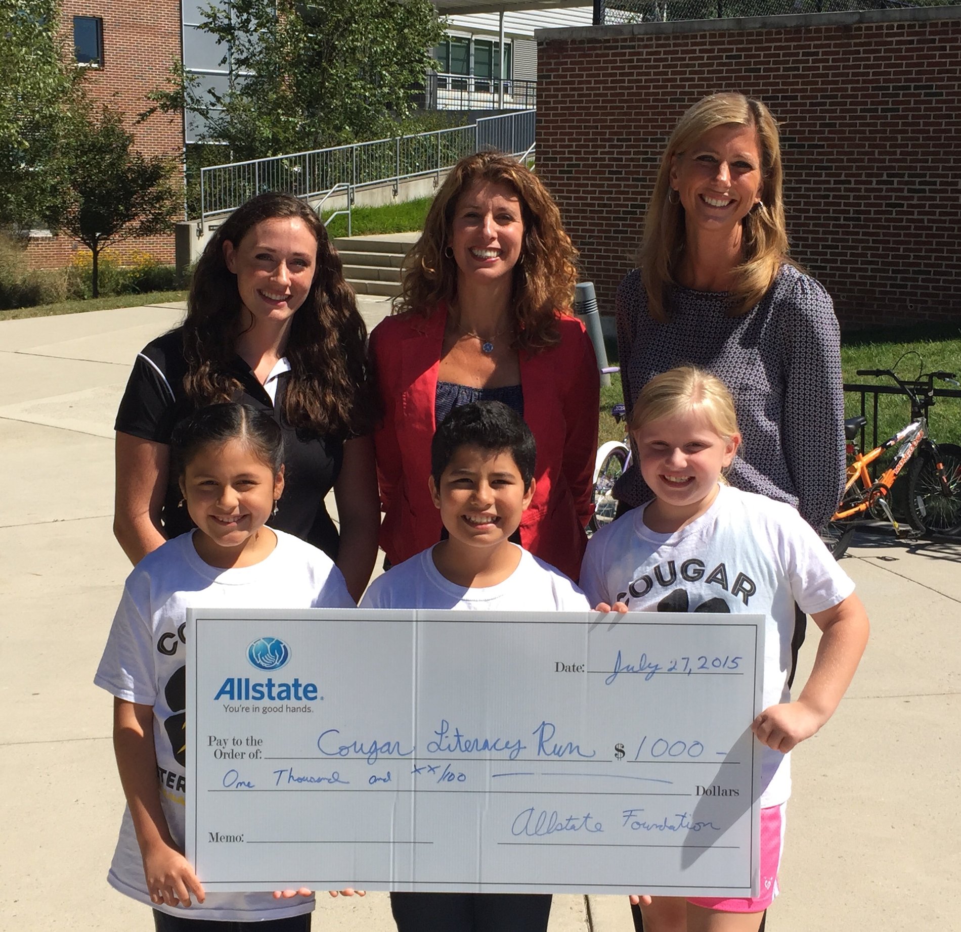 Gainesville, VA Allstate car insurance agent Christine Angles received an Allstate Foundation award and a $1,000 grant for the Cougar Literacy Run.