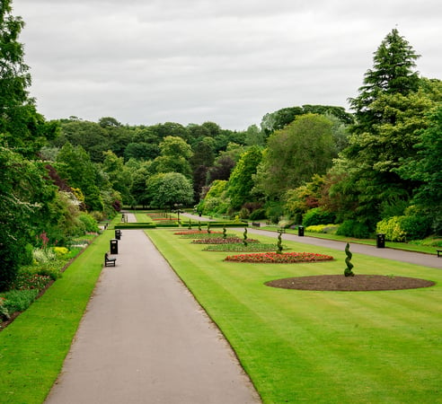 Benches and flower beds in Seaton Park in Aberdeen, Scotland