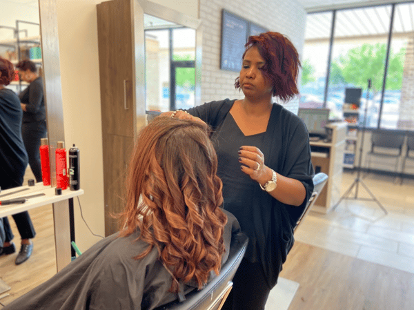 Consulting a customer on their hair extensions