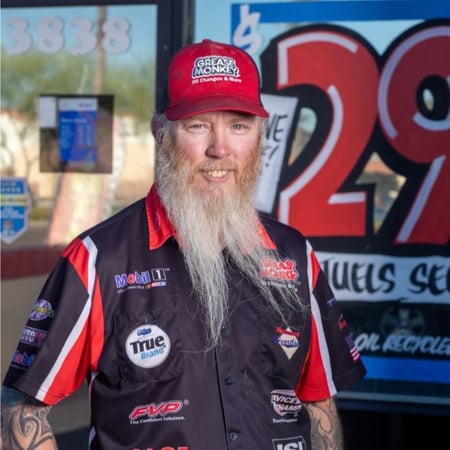 Picture of thad in front of Grease Monkey Phoenix location on Thunderbird Road