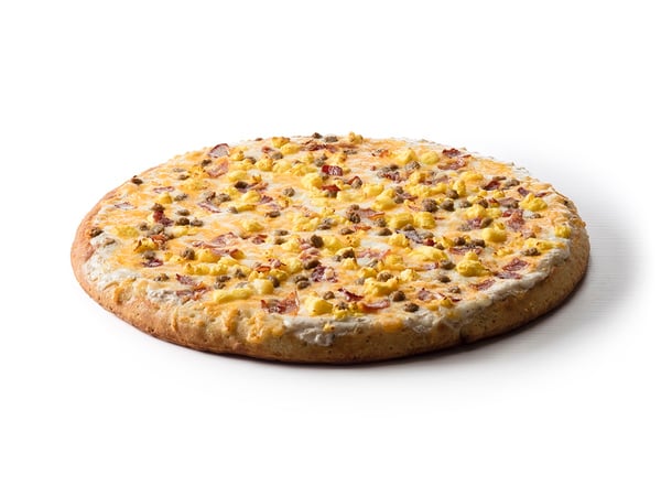 An extra large breakfast pizza with egg, sausage, bacon and gravy.