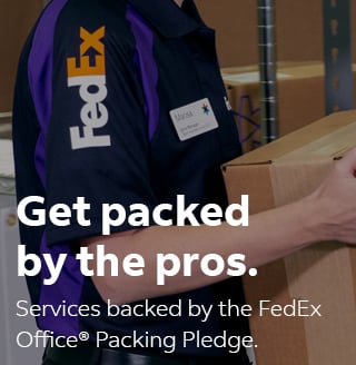 Image of FedEx Office employee packing services backed by the FedEx Office packing pledge