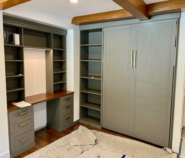 Wall bed with shelving and drawers