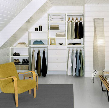 Angled under stairway storage reach in closet by California Closets