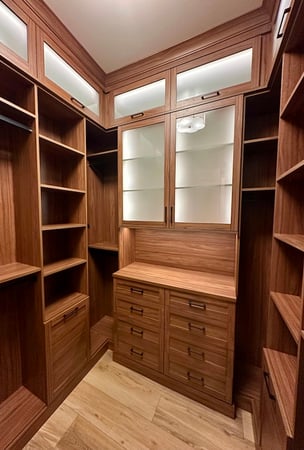 Walk in closet design with custom closets, closet organizers, closet cabinets, drawers, shelving, and closet organization, Washington, Michigan by California Closets Greater Detroit