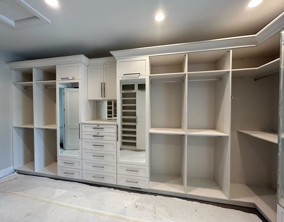Custom Wall unit with stacked drawers, 2 mirrored doors, hanging, and light beige color