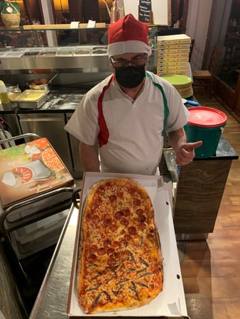Natale mit eine gigantische Pizza