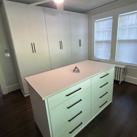 Greensboro - Custom closets - walk-in closet with floor-to-ceiling cabinet doors and a center island for extra storage