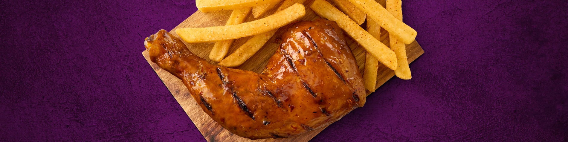 New Quarter Chicken Meal from Steers® on a wooden board placed on a grey surface with a purple background.