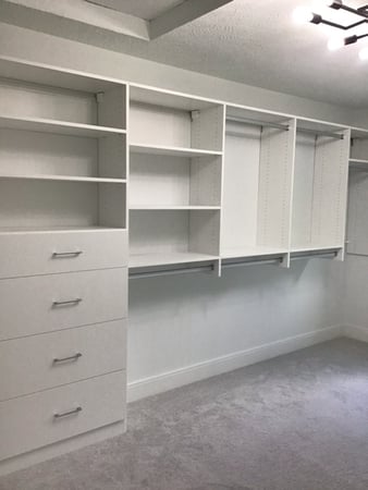 White walk-in with drawers and shelving