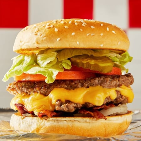 A close-up image of a Five Guys cheeseburger.