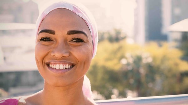 A smiling cancer survivor.
