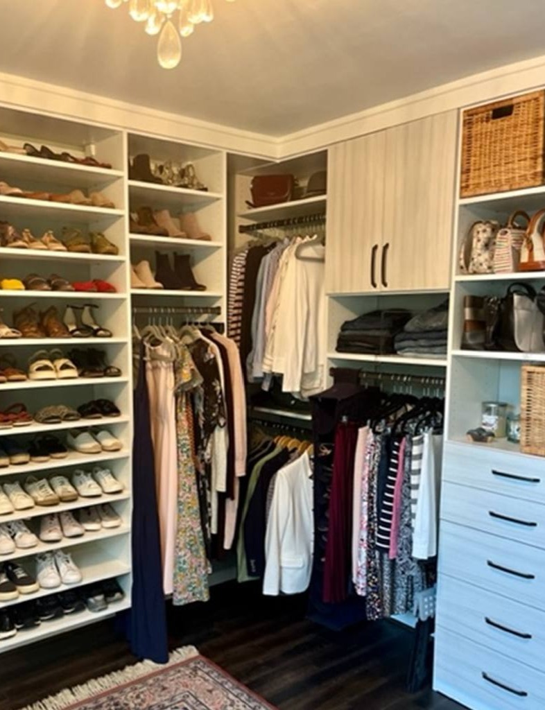 Richmond - Custom closets - Organized walk-in closet with shoe shelves, drawers, and a cabinet