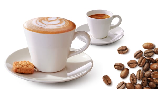 A cappuccino cup and an espresso cup on a white background
