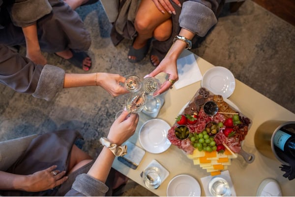3 ladies cheers champagne charcuterie private spa party rogers nwa
