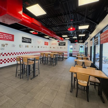 Photograph of the dining room of the Five Guys restaurant at 2240 NW 19th Street in Boca Raton, Florida.