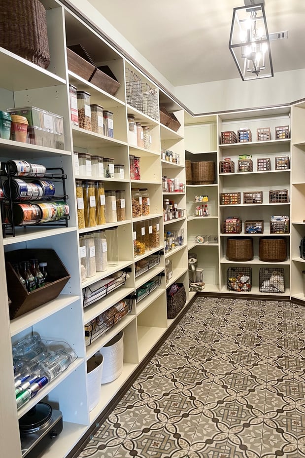 Walk-in closet pantry with cabinets and shelving California Closets Gulf Coast & New Orleans