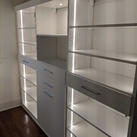 Richmond - Custom closets - Walk-in closet with lights on shelves